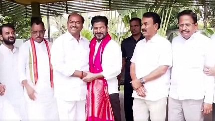 <div class="paragraphs"><p>Bandla MLA Krishna Mohan Reddy with Chief Minister A Revanth Reddy.&nbsp;</p></div>